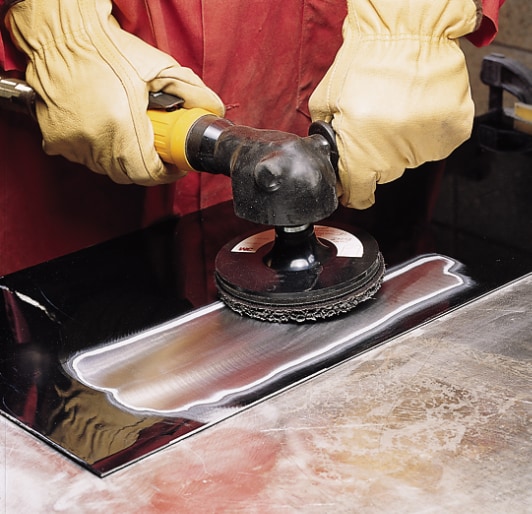 Scotch-Brite™ Coating Removal Disc features extra coarse (XCS) silicon carbide mineral to effectively remove paint and rust from metal surfaces and welds. Together with the conformable, non-woven material, silicon carbide abrasives remove coatings without gouging, undercutting, or damaging the base material, especially on hard surfaces.