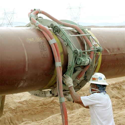 man priming pipe