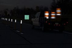 PH_US_AdvFlexEG_posts-on-roadway-and-truck-night.tif