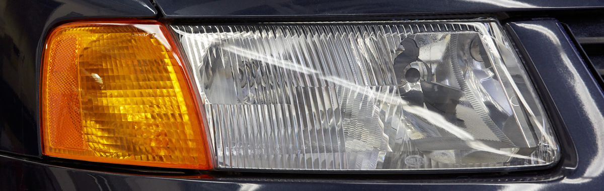 Before and after pictures of headlight restoration.