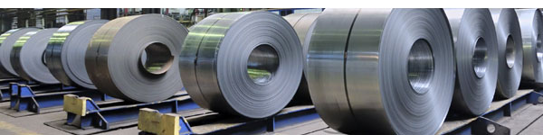 Giant metal rolls in warehouse