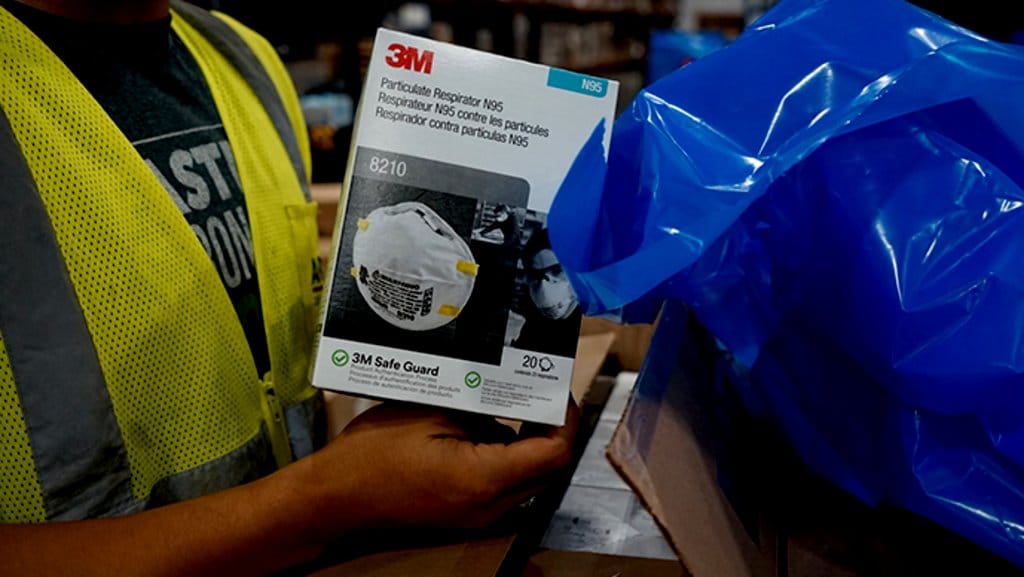 3M respirator being packed by Direct Relief for aid shipment