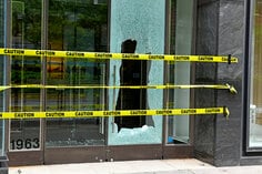 This asset is Shutterstock ID 1747212032. This is licensed from Shutterstock Images. Unlimited seats were licensed there is no charge to use this image. Please download and use as needed, but include this Celum ID in Release Comments for new content loaded to Celum utilizing this asset. Title: Broken glass window on retail store front from criminals looting and rioting in Manhattan New York during racial protests