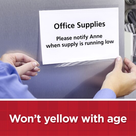 Scotch® Transparent Tape application image showing a hand applying a piece of tape to adhere small sign stating 'office supplies' on a cabinet.