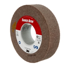 A Scotch-Brite Cut and Polish Wheel, 5A Fine, 8 inches by 2 inches x 3 inches