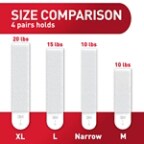Four Command™ Picture Hanging Strips (XL, L, Narrow, M) showing a weight comparison for the different sizes. 4 XL pairs holds 20 lbs. 4 L pairs holds 16 lbs. 4 Narrow pairs holds 10lbs. 4 M pairs holds 12 lbs.