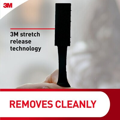 3M logo. 3M® stretch release technology. Removes cleanly. A person is removing a Picture Hanging Strip.
