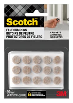 Scotch Felt Bumpers in package. 15 felt bumpers shown. Package of 90. A person's hand is shown closing a cabinet door.