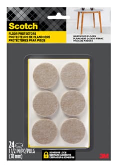 Scotch Floor Protectors in packaging. Six floor protectors are visible in the packaging. A table sits on hardwood flooring.