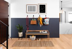 3M CLAW™ Drywall Hooks are used in the entryway of a house to hold a variety of items including a backpack, leash and pocketbook. 