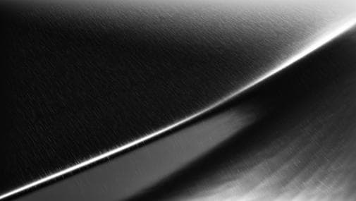 A swatch of 3M™ Wrap Film Series 2080 Brushed Black Metallic