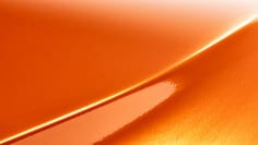 A swatch of 3M™ Wrap Film Series 2080 Gloss Burnt Orange