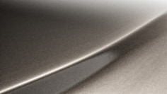 A swatch of 3M™ Wrap Film Series 2080 Gloss Charcoal Metallic