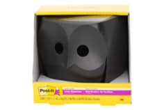 An image of a Post-it Notes Pop up dispenser in the shape of a black owl. The bird is matte black and in color and has a modern, minimalist design.  The dispenser comes with one pack of Post it pop up Notes in the color of Citroen. Citroen is a tropical tint of orange yellow and green..