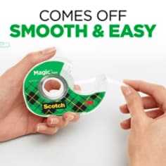 A hand is holding a scotch tape dispenser in one hand, and the other hand is pulling tape off the dispesner on a white background. The copy above readhs 'comes off smooth and easy'