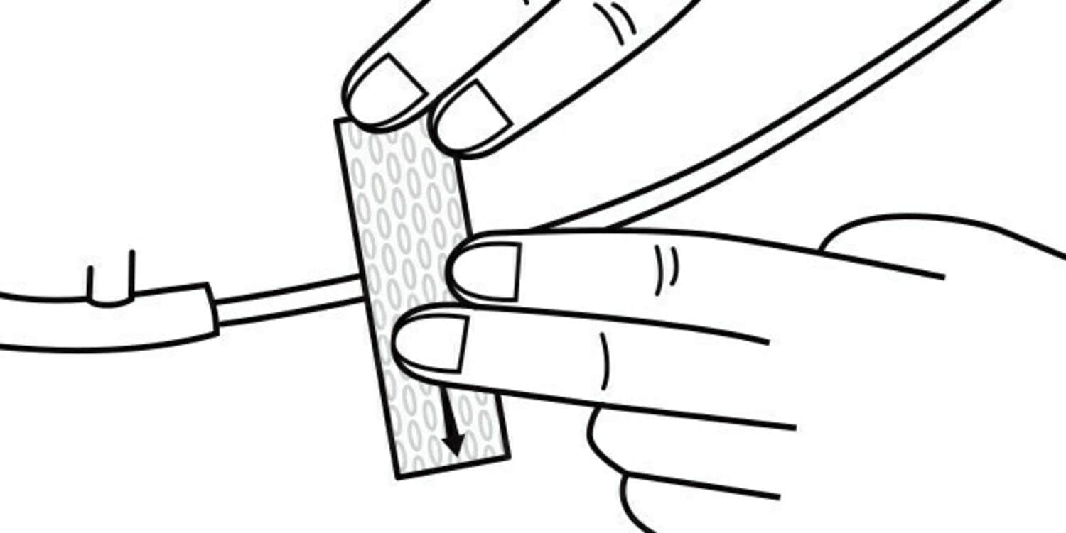 Illustration of fingers using tape to secure tube