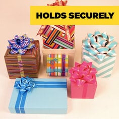 Scotch Expressions Colored Masking Tape holds securely.  Several gifts are wrapped and adorned with masking tape. 