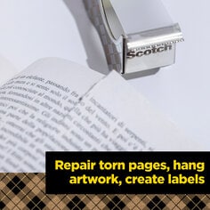 Scotch Magic Tape made from 66 percent plant-based adhesive helps repair torn pages, hang artwork and create labels.  Image of a torn book and a Scotch Stainless Steel Tape Dispenser.