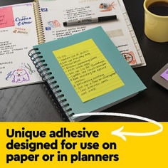 Post-it Notes have unique adhesive designed for use on paper or in planners.  Image of Post-it Notes with written notes on a planner. 