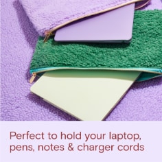 Noted by Post-it is perfect to hold your laptop, pens, notes, and charger cords.  Image of a a purple laptop pouch with a laptop and a green laptop pouch with a laptop coming out of the top of the pouch. 