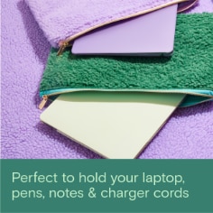 Noted by Post-it is perfect to hold your laptop, pens, notes, and charger cords.  Image of a a purple laptop pouch with a laptop and a green laptop pouch with a laptop coming out of the top of the pouch. 