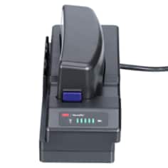 A 3M Versaflo Single Station Battery Charger Kit TR-342N, plugged in and powered on with bright LED lights