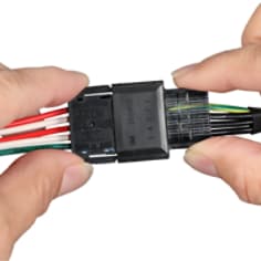 3M Power Clamp Wiremount 358 Series Plug and 355 Series Socket, Action Shot with Hands