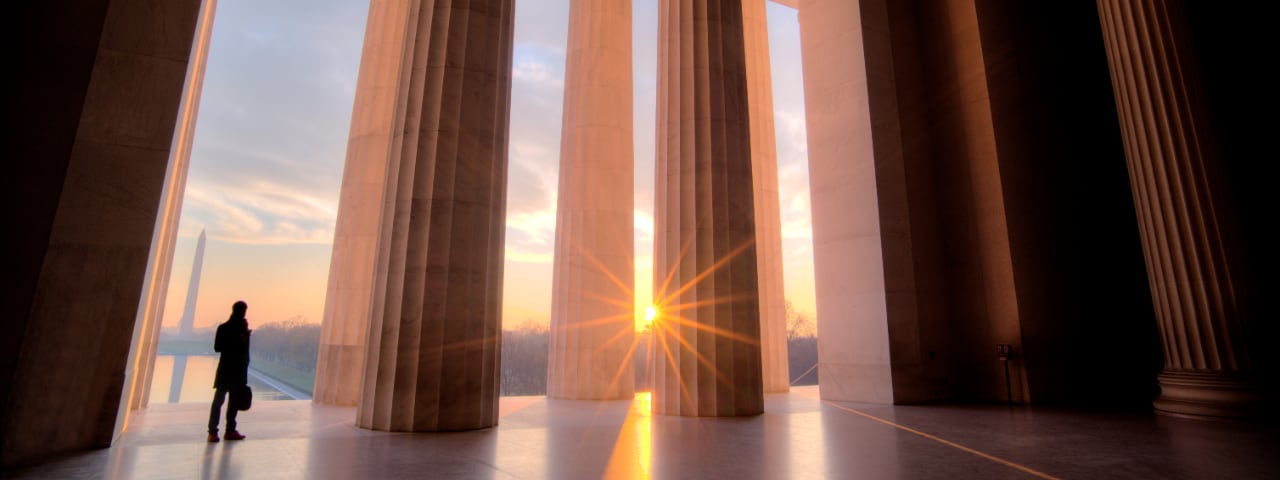 Photo of a person overlooking the Lincoln Memorial landscape in Washington D.C.