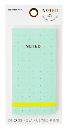 Product image of a sticky note pad with green cover and white dot grid interior