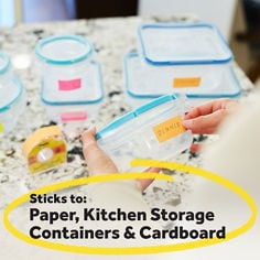 Post it®, Label On-a-Roll 658, B+ 04, JPG file, sitcks to paper, kitchen storage containers, & cardboard, image of a lady holding an airtight container, sticking a Post-it On-a-Roll label on it.