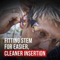 Image of a man putting on 3M™ Push-Ins™ Corded Earplugs 92501, fitting stem for easier insertion