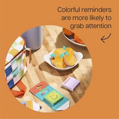 Render of orange Post-it® notes, class notes and a school bag. Reader: colorful reminders are more likely to grab attention.