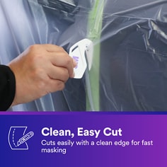 A hand cuts plastic sheeting along taped trim to show easy cutability. Clean, Easy Cut, Cuts easily with a clean edge for fast masking.