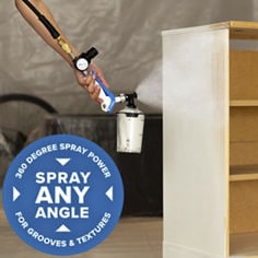 Wooden cabinet being painted with ScotchBlue Paint Sprayer with 360 Degree Spray Power promotional text
