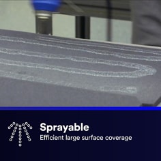Close-up application photo showing adhesive being sprayed across a foam-like surface. The asset states Sprayable, efficient large surface coverage.