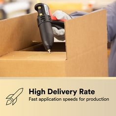 Hot melt applicator is used on a corrugated carton. The asset states High Delivery Rate, fast application speeds for production.