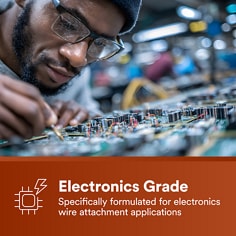 Technician works on an electronics assembly to show electronics-grade use. The asset states Electronics Grade, specifically formulated for electronics wire attachment applications.
