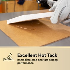 Foam or beadboard is lifted from corrugated material after adhesive application. The asset states Excellent Hot Tack, immediate grab and fast-setting performance.