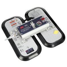 A 3M DBI-SALA self-contained vacuum anchor is shown against a white background. The device has two large vertical suction pads with rounded black rubber edges and silver textured surfaces. Warning and inspection labels are printed on the upper portions of the pads.
