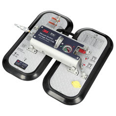 A 3M DBI-SALA self-contained vacuum anchor is shown against a white background. The device has two large vertical suction pads with rounded black rubber edges and silver textured surfaces. Warning and inspection labels are printed on the upper portions of the pads.