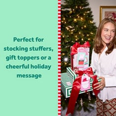 Post-it® brand image split into two sections, right side showing a person near a Christmas tree holding holiday notes, left side with text that reads "Perfect for stocking stuffers, gift toppers or a cheerful holiday message."