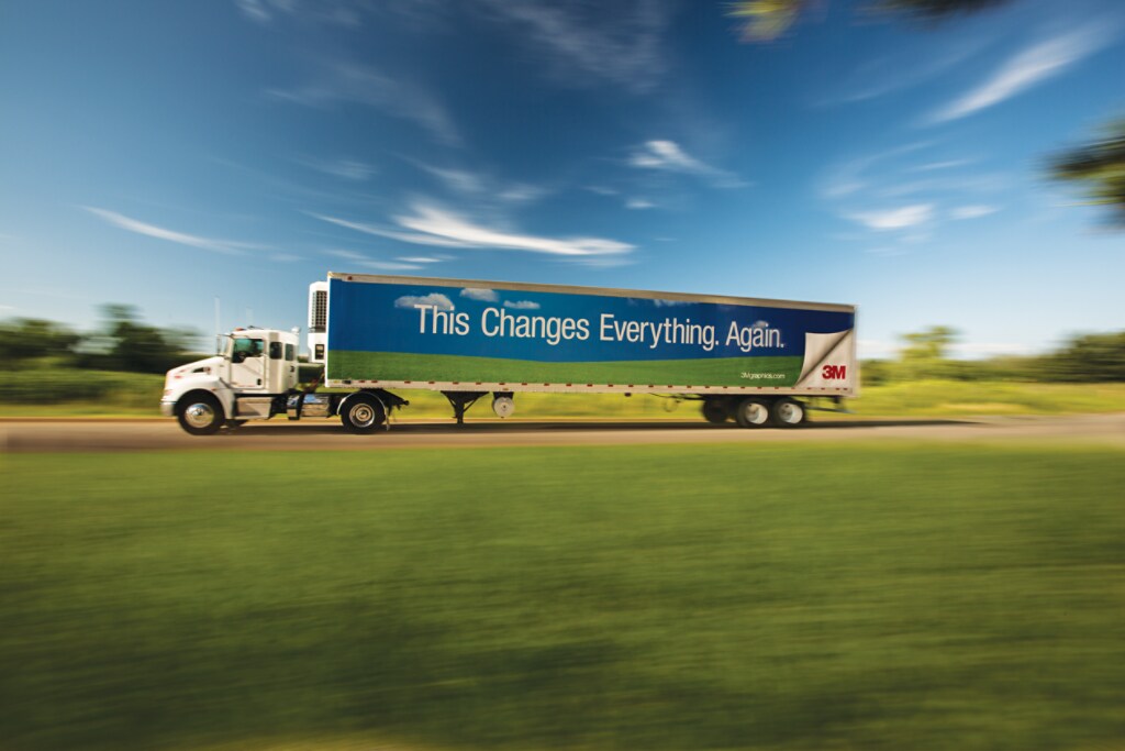 Fleet truck wrapped with commercial graphic