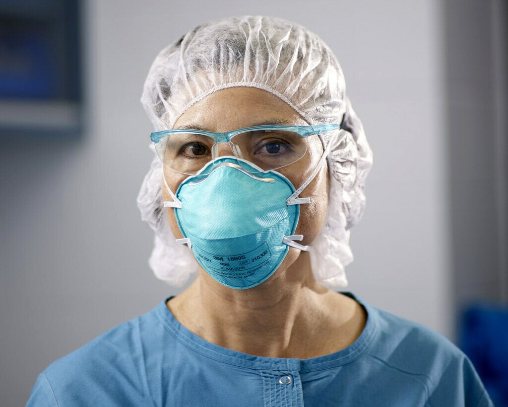 Healthcare professional wearing N95 respirator 