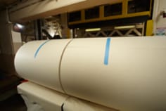 3M(TM) Repulpable Tapes on Twin Drum Winder Roll Close