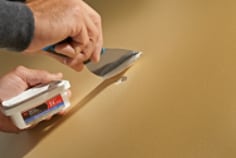 3M(TM) PATCH plus primer spackling compound application image.