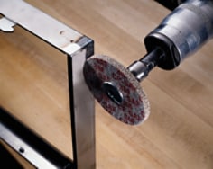 Scotch-Brite(TM) Cutting and Polishing Unitized Wheels. Diameters: 1/2in minimum 14in maximum. Density: 5 Aluminum Oxide FIN, 7, 9 Aluminum Oxide MED & CRS. 7, 9 Silicon Carbide MED. Image No 17 Parting line removal on metal frame application. Image in Scotch-Brite(TM) Surface Conditioning  Wheels Brochure No 61-5002-8001-3