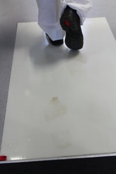 Clean-Walk Mat 5830 application shot with dirty boots